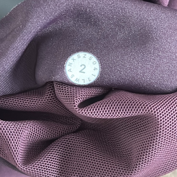 Lululemon In Movement tight. Inseam 25 inches. Color- eggplant. Size- 2 - Picture 6 of 8